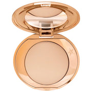 BAJO PEDIDO - Charlotte Tilbury Airbrush Flawless Finish Refillable Powder Mini — Polvo Compacto Refillable De Acabado Suave y Difuminador En Tamaño Mini