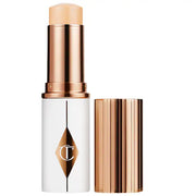 BAJO PEDIDO - Charlotte Tilbury Unreal Skin Sheer Glow Tint Hydrating Foundation Stick Base en Barra Hidratante de Cobertura Ligera con Acabado Luminoso